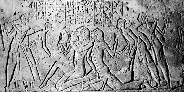 Shasu spies being beaten on Ramses II wall relief